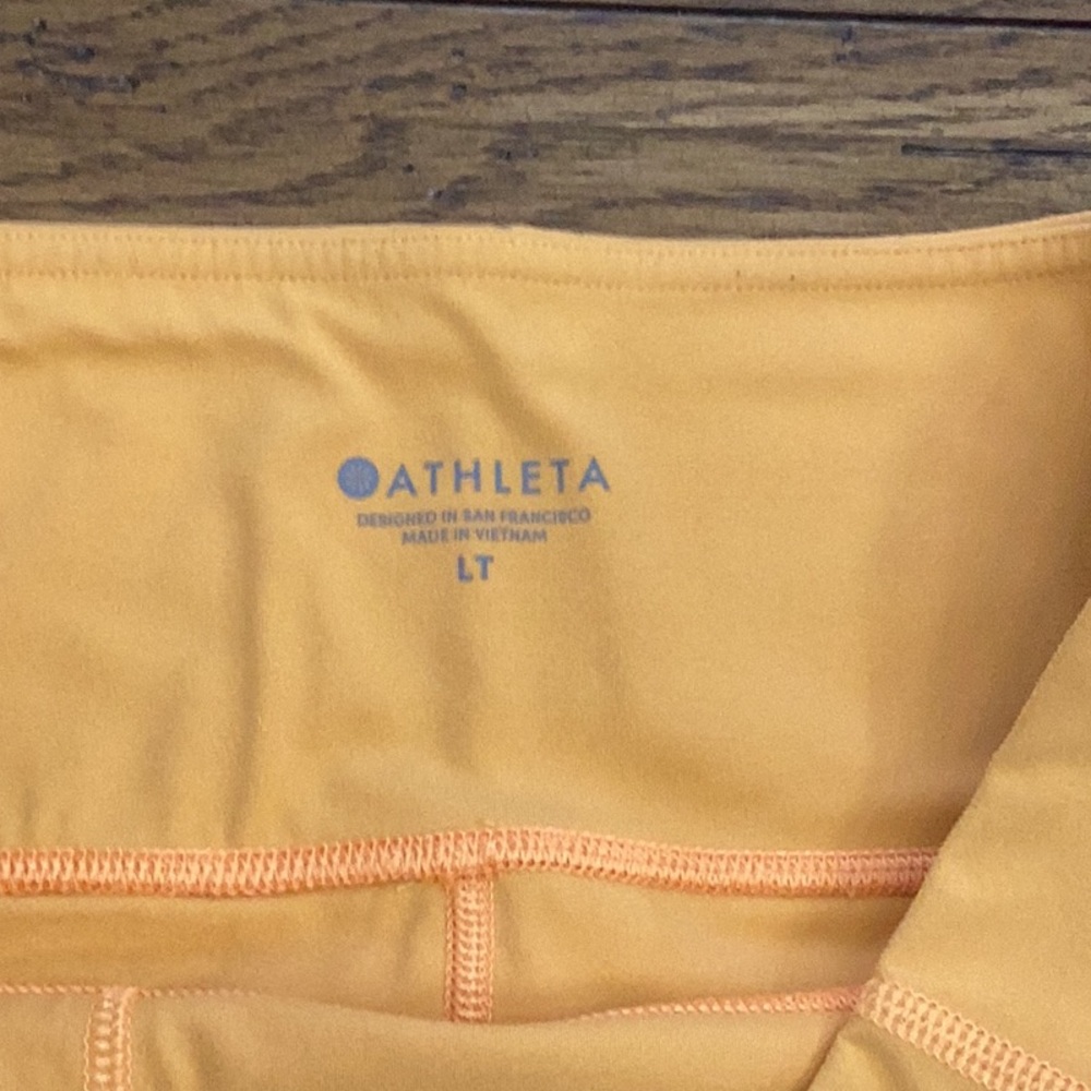 Athleta Orange Stash Pocket Leggings - Picture 2 of 4
